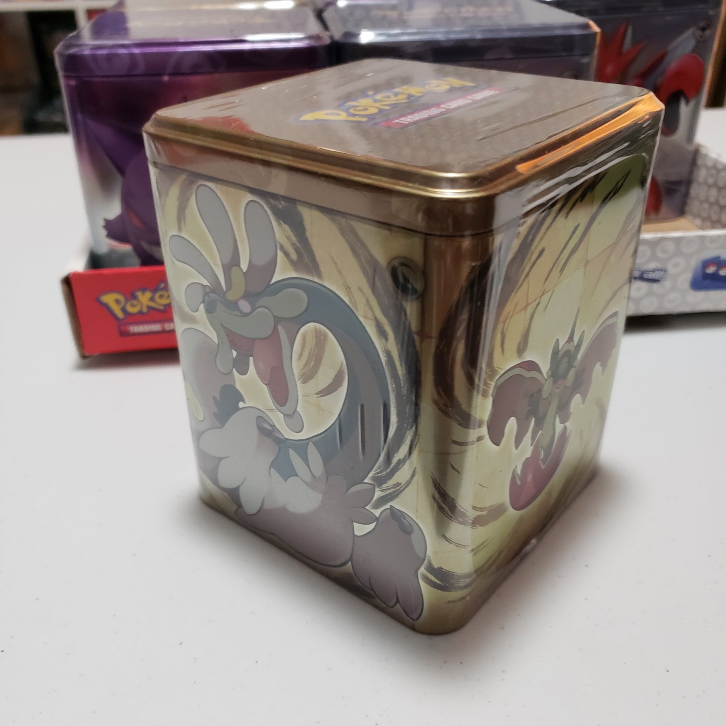 Pokemon TCG: Stacking Tin Q1 2024 (Psychic, Metal and Dragon)